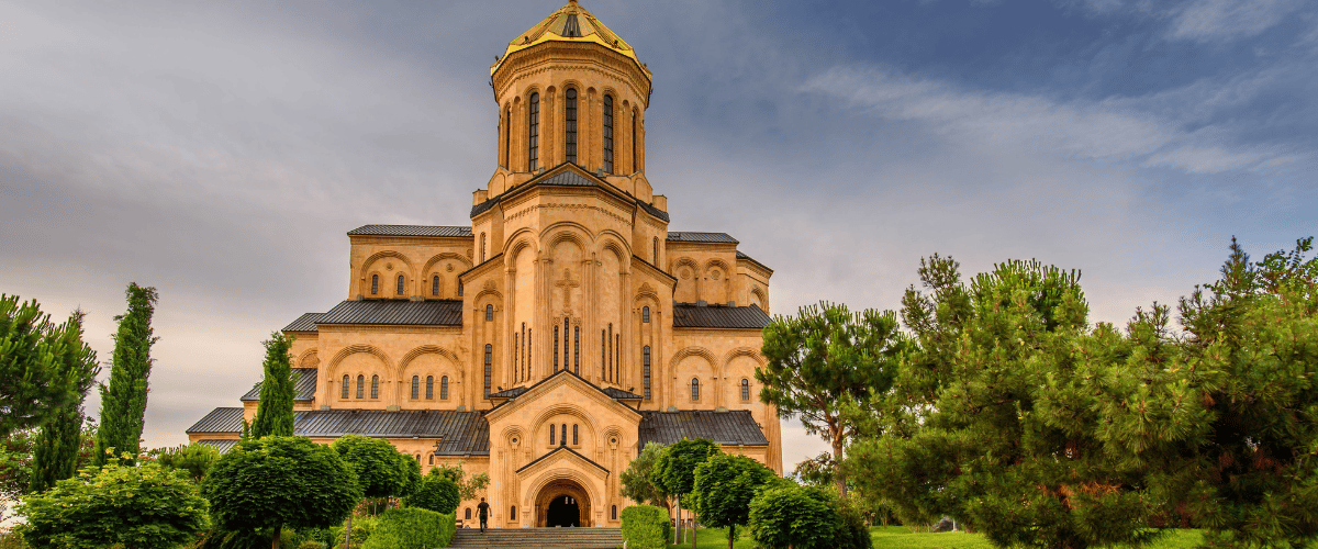Exploring the outdoors in Tbilisi: The Holy Trinity Cathedral (Sameba) view, a must-visit for Georgia travel adventures.