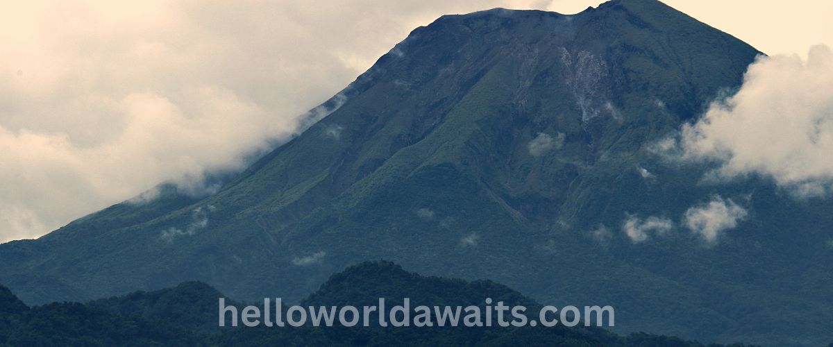 Active volcano landscape in Legazpi City, featuring the famous Mount Mayon peak and lush green slopes, a top Bicol region tourist attraction.