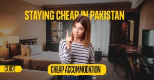 A woman pointing up in a budget hotel room, featuring a guide on finding cheap accommodation in Pakistan.