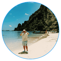 A man taking a photo of himself on a beach in the Philippines